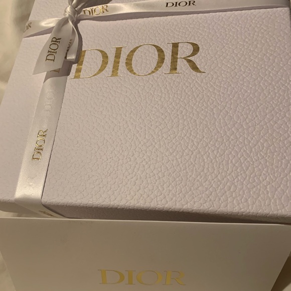 Brand new authentic rare and collectible texturedDior box with ribbon. Must !